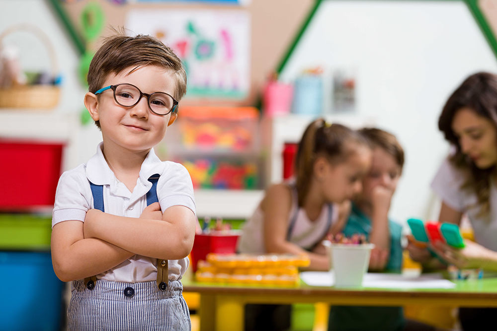 little boy in childcare playroom image